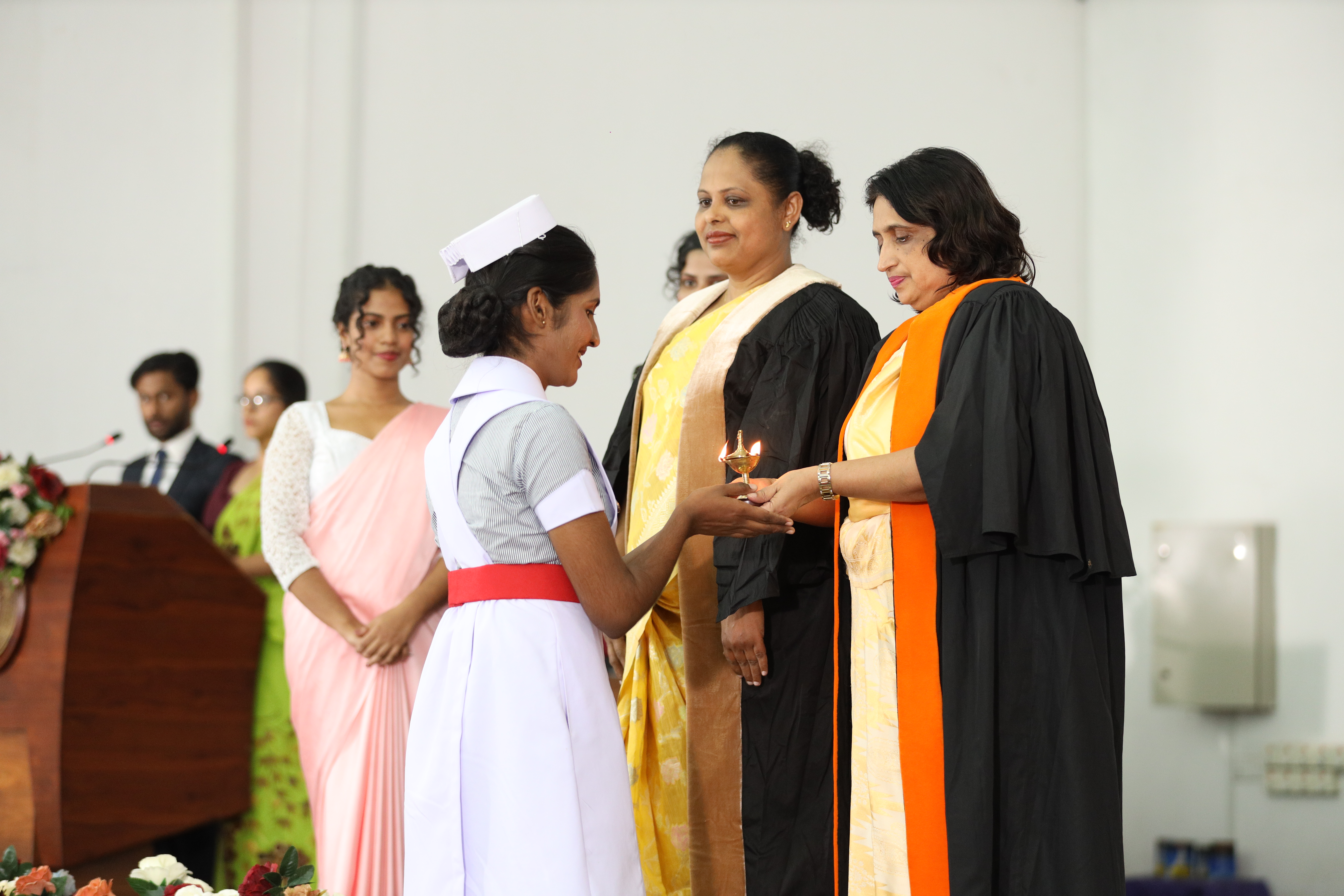 Nursing students with their caps and lamps